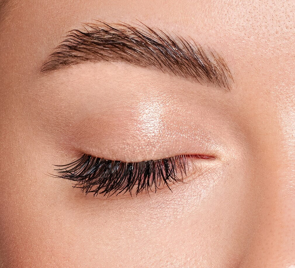 Female eye with long false eyelashes